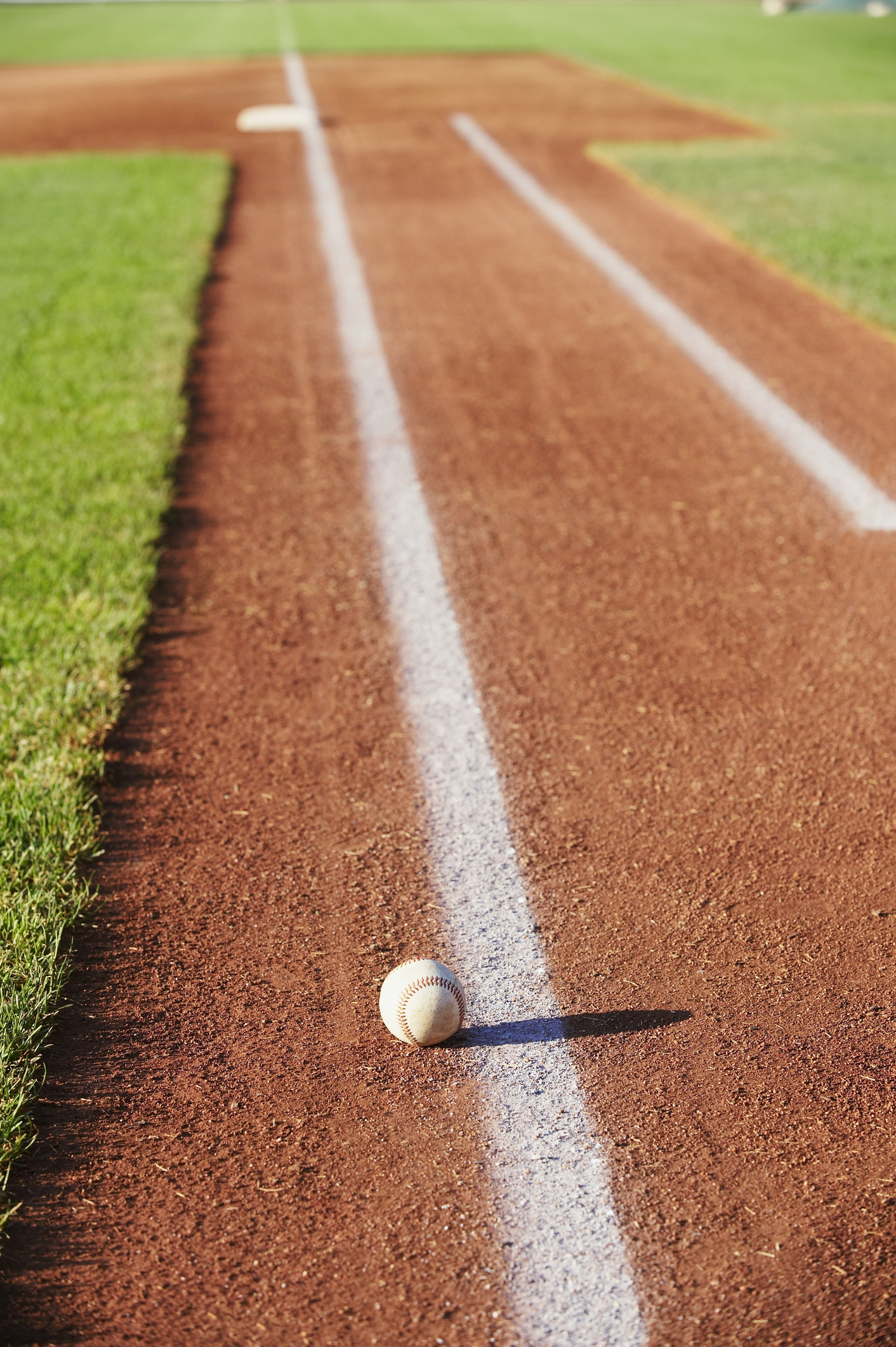 Baseball along baseline