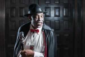 Vampire at adult halloween party