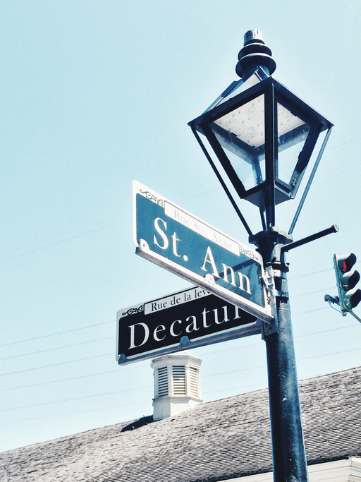 Low Angle View Of Road Sign Against Clear Sky