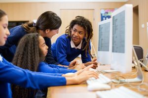 Students learning computer programming