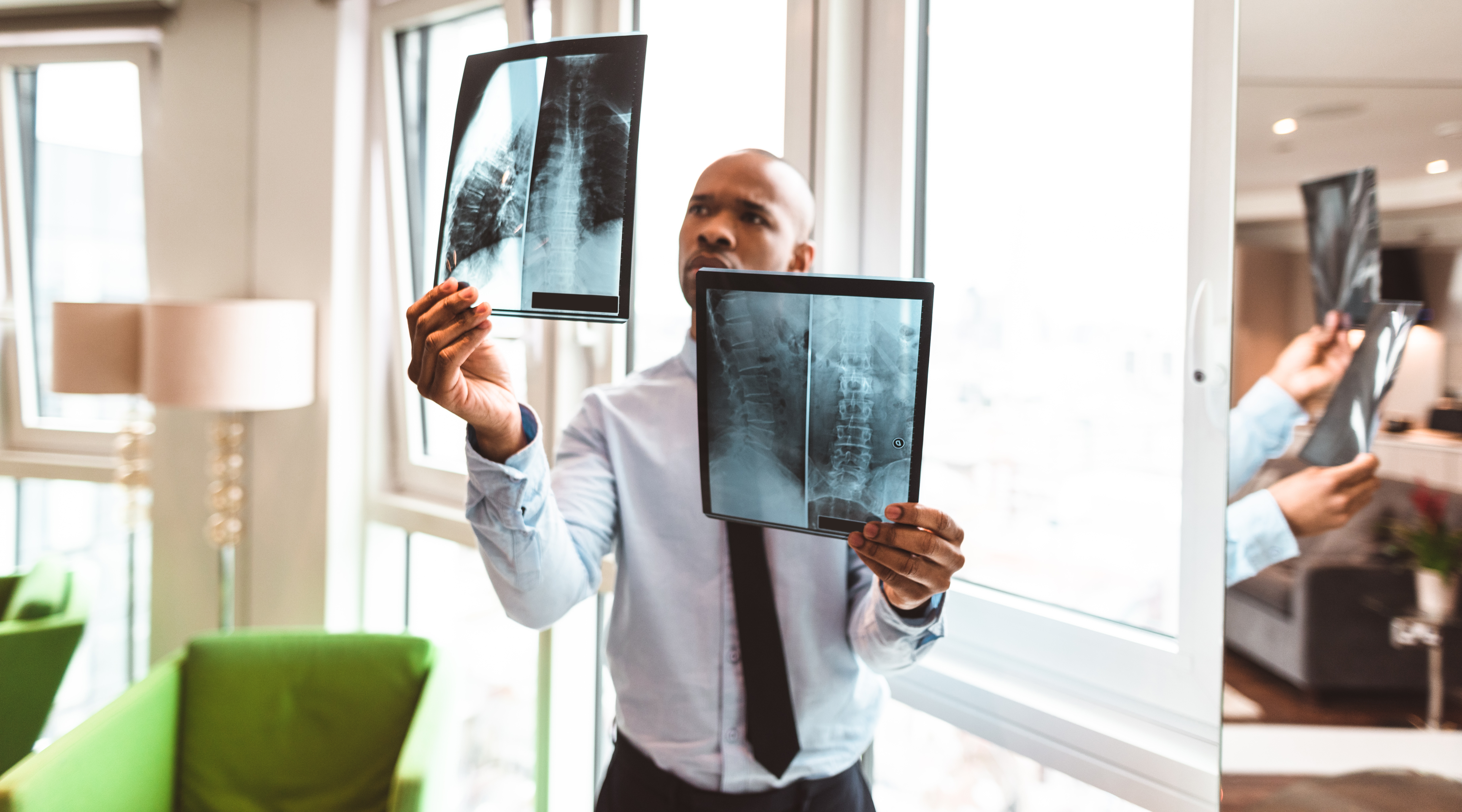 doctor reading the x-ray in the office