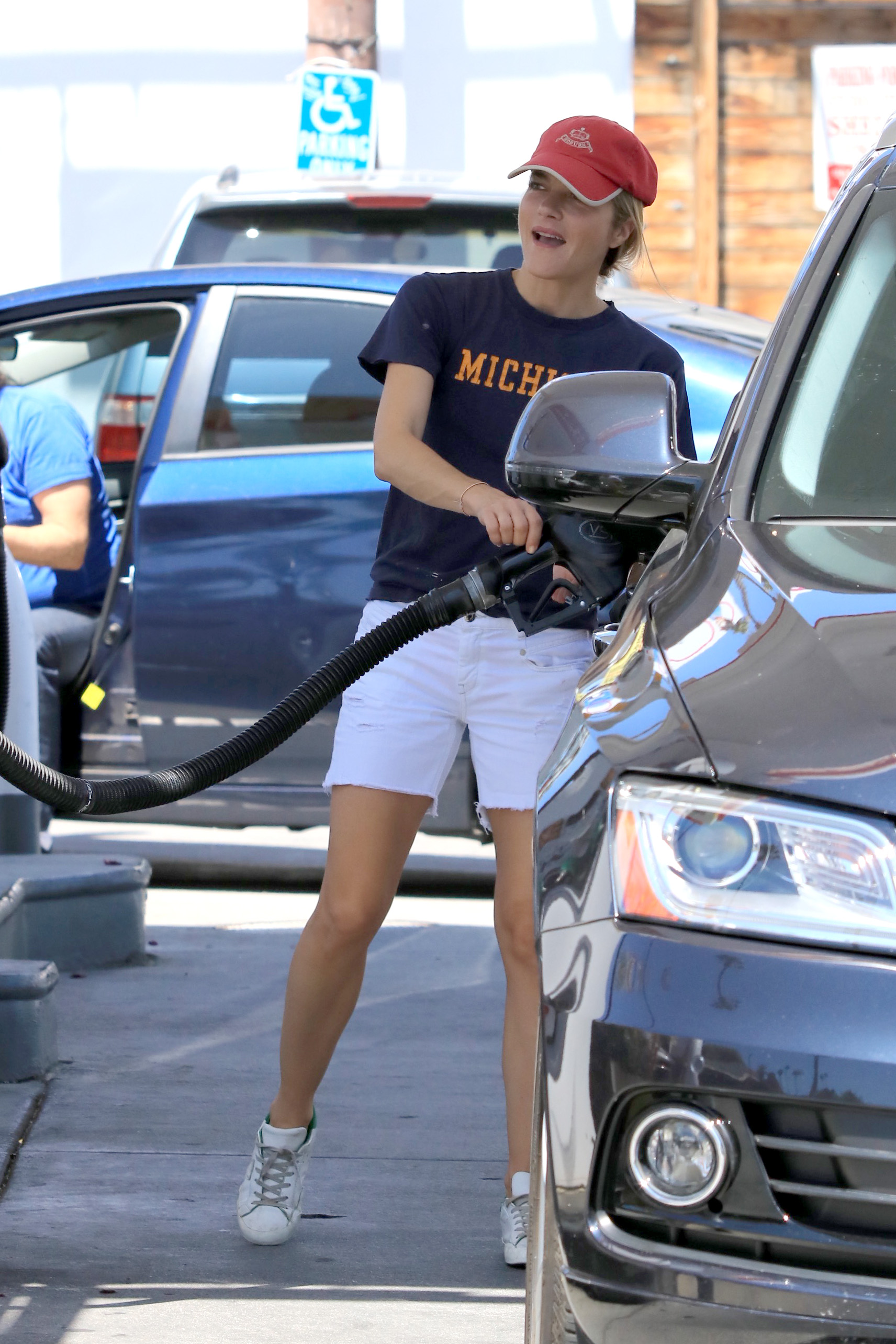 Selma Blair pumping gas