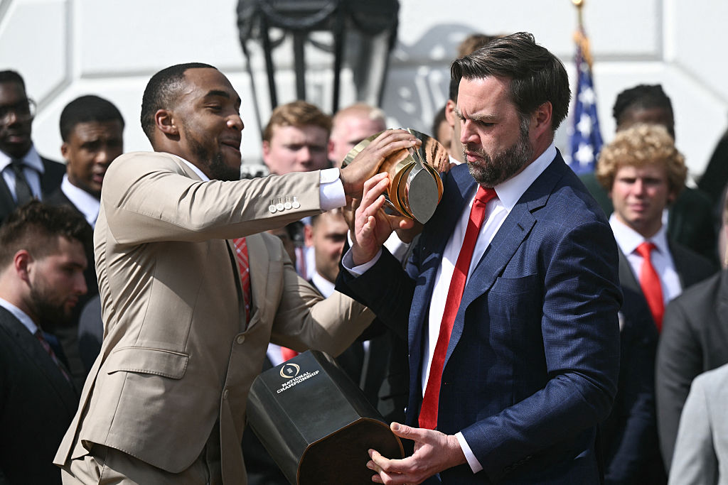 US-POLITICS-TRUMP-COLLEGE-FOOTBALL