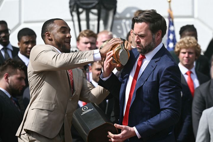 US-POLITICS-TRUMP-COLLEGE-FOOTBALL