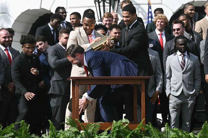 US-POLITICS-TRUMP-COLLEGE-FOOTBALL
